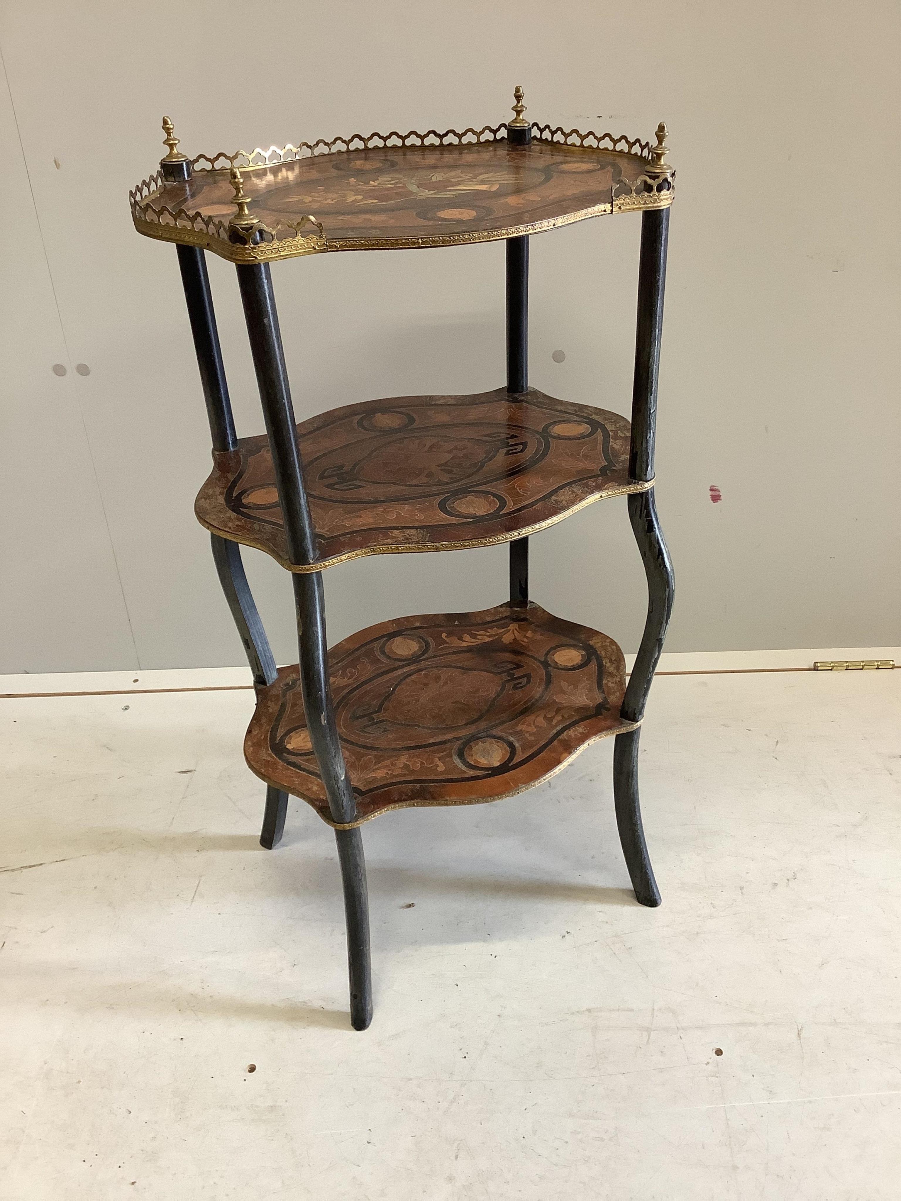 A Napoleon III marquetry inlaid three tier etagere, height 79cm. Condition - fair